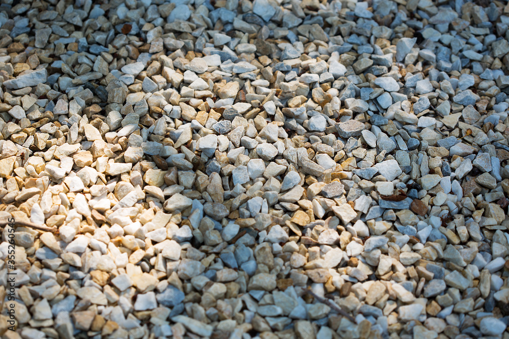 pebble gravel background with abstract shadow