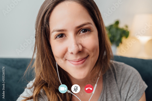 woman smiling during a video call. zoom skype app