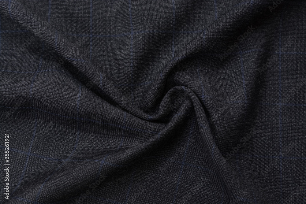 blue checked fabric tablecloth. Polyester gray fabric with a blue checkered pattern, background, drapery, top view blue checked fabric tablecloth. Polyester gray fabric with a blue checkered pattern, background, drapery, top view