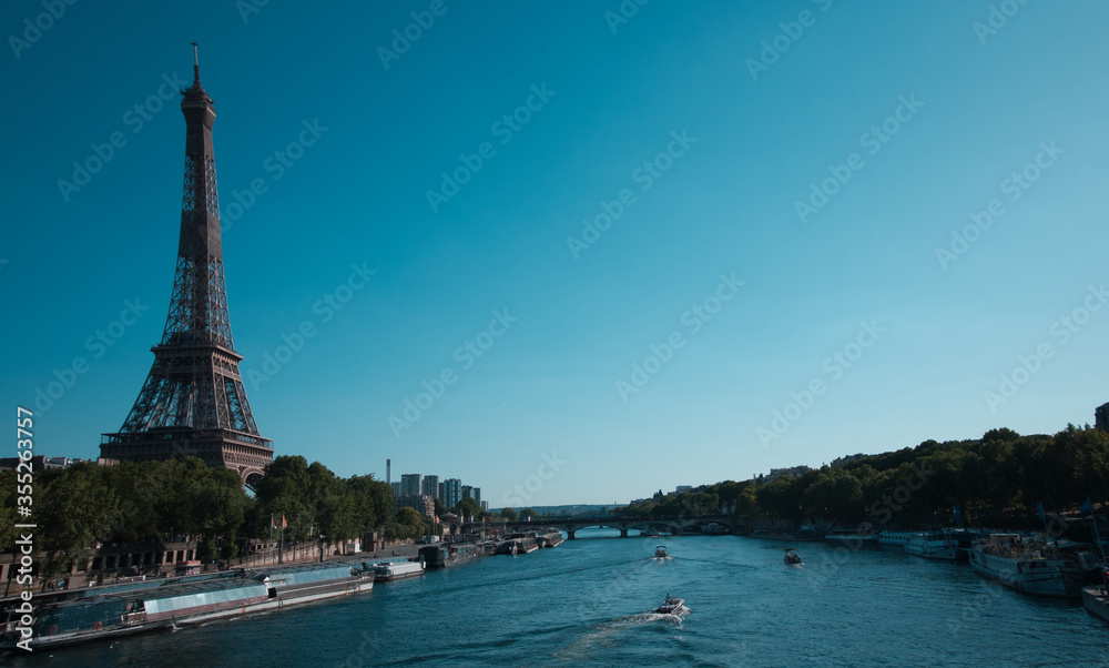 Paris along the Seine River: An amazing area with plenty of beautiful points of interest: Eiffel Tower, Jeanne of Arc Statue, mini Statue of Liberty, The Seine River, the Lover's Bridge, the Barges,..