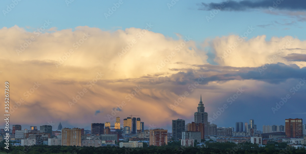Moscow city skyline before the thunderstorm, dramatic sky, panoramic view.