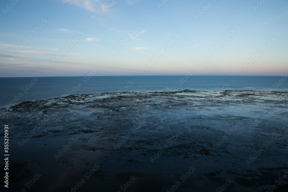 Seascape. Aerial Panorama view of the Atlantic ocean at sunset. Skyline. Beautiful sea water texture and color in the end of the world, Ushuaia, Tierra del Fuego, Patagonia Argentina