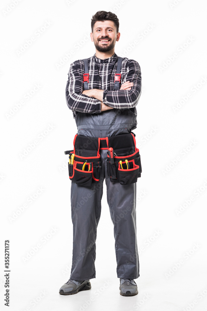 Full length portrait of handyman with tool belt on white background Full length portrait of handyman with tool belt on white background