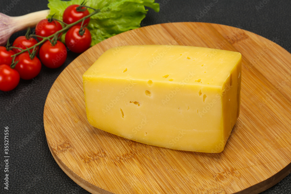 Hard yellow tasty cheese brick Hard yellow tasty cheese brick