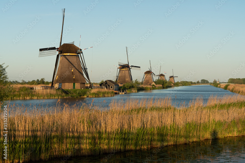 The windmills near the water in Kinderdijk, a UNESCO World Heritage site in Rotterdam, Netherlands