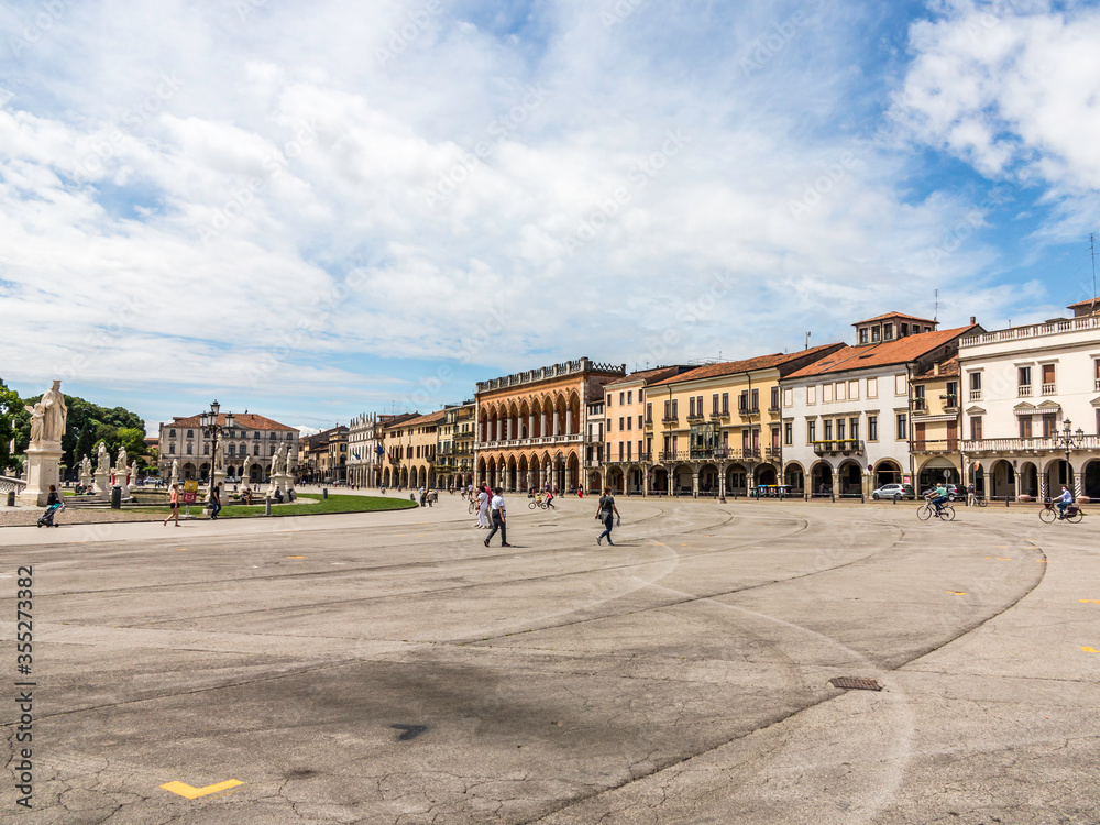 Streets of urban center of classic italian city of Padua with no cars at daytime, with Prato della Valle square