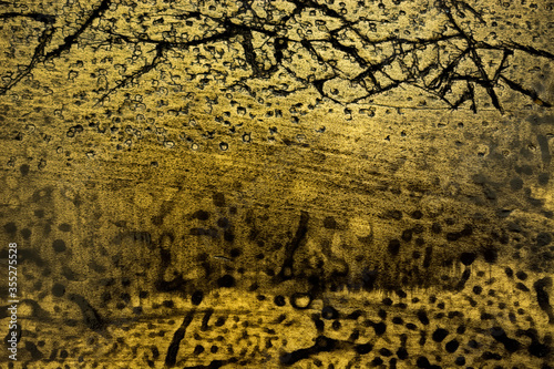 Light brown with gold abstract texture with dark scratches, cracks and spots