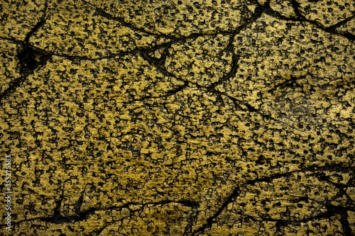 Light brown with gold abstract texture with dark scratches, cracks and spots