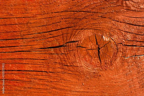 Natural wood texture closeup painted red color
