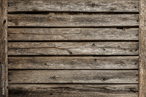 Wooden background old wooden wall of a village house with texture