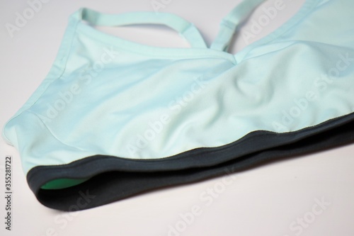 Obraz na plátně aqua blue sports bra on the table