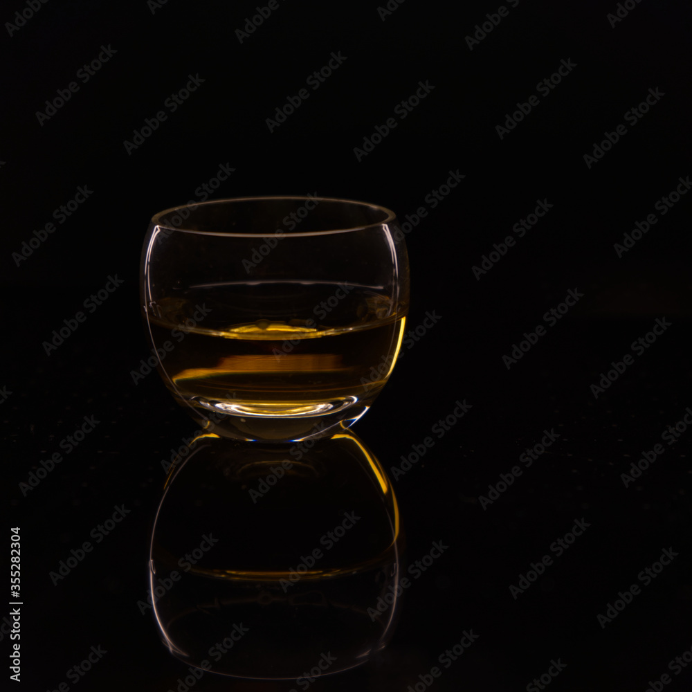 Rum in Glas with Black Background