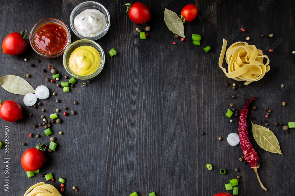 Cooking food background with free space for text. Composition with ingredients over the wood background. Ingredients for cooking with copy space. Top view with copy space Cooking food background with free space for text. Composition with ingredients over the wood background. Ingredients for cooking with copy space. Top view with copy space