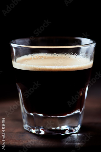 Cup of espresso on dark background. Close up.