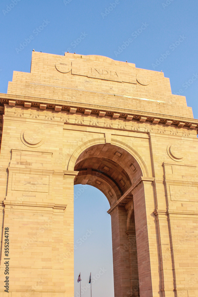 Blue Sky and Two Flags in the Archway of India Gate at Rajpath Park in New Delhi, India