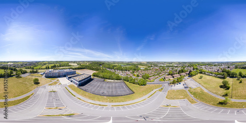 Cleckheaton UK, 29th May 2020: 360 Degree panoramic sphere aerial photo of the Whitcliffe Mount Primary School, showing an aerial photo of British school building on a bright sunny summers day photo