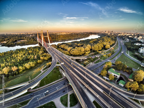 Warsaw, Poland 2018. Siekierkowski bridge modern suspension bridge over Vistula river in southern district, along Trasa Siekierkowska street in Wawer, Praga Południe, Goclaw districts.