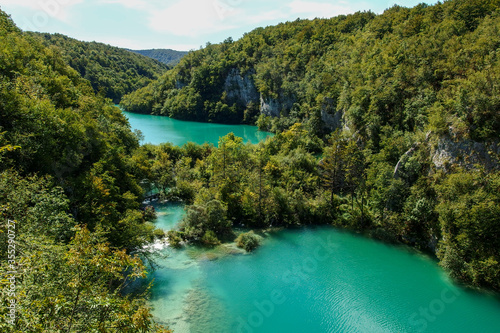 Plitvice Lakes National Park, Croatia. Nacionalni park Plitvicka Jezera, one of the oldest and largest national parks. UNESCO World Heritage. View from above on turquoise lakes in rock valley. © Bartosz
