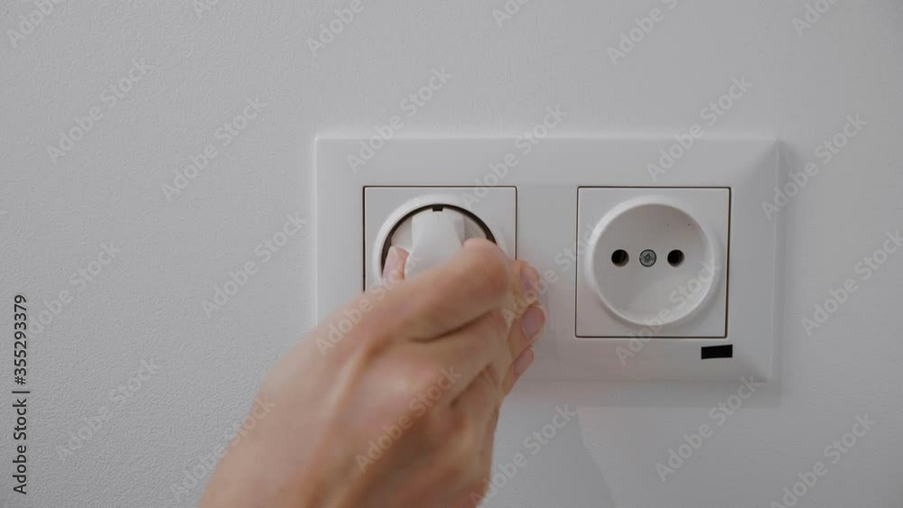 hand pull out charger adapter into wall socket. Energy Saving Concepts and Technologies
