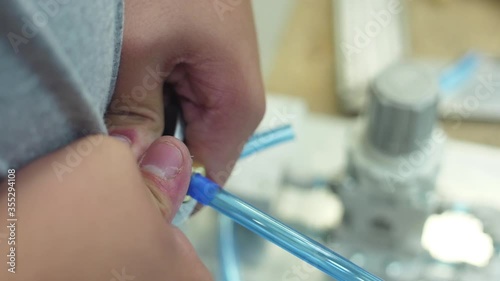 Wallpaper Mural tighten brass nut with wrench in pneumatic automation system Torontodigital.ca