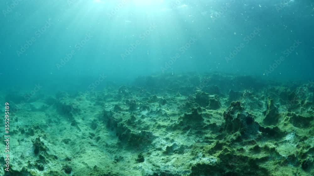 sun ray and sun beam scenery underwater waves on surface of water slow ocean scenery sun ray and sun beam scenery underwater waves on surface of water slow ocean scenery