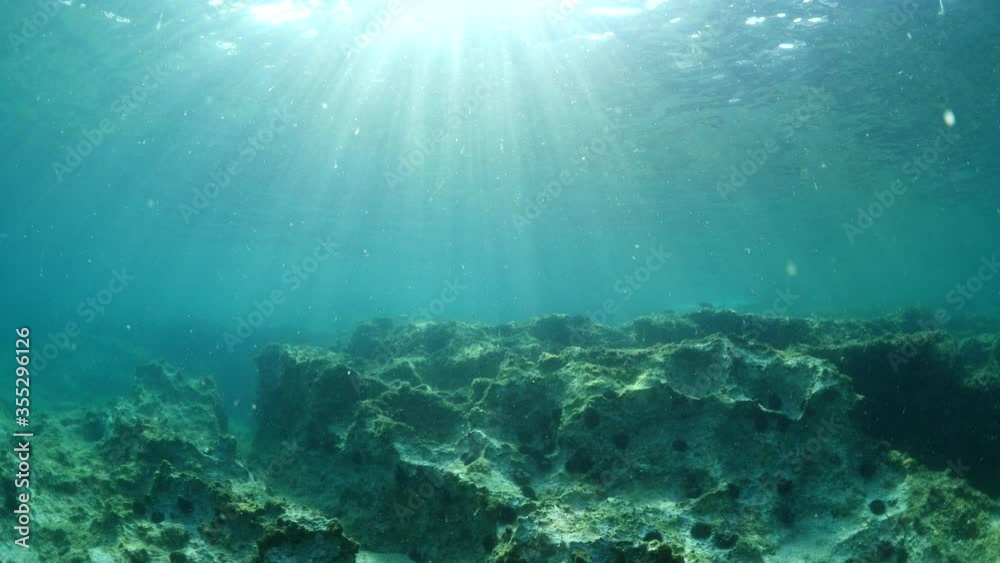 sun ray and sun beam scenery underwater waves on surface of water slow ocean scenery sun ray and sun beam scenery underwater waves on surface of water slow ocean scenery