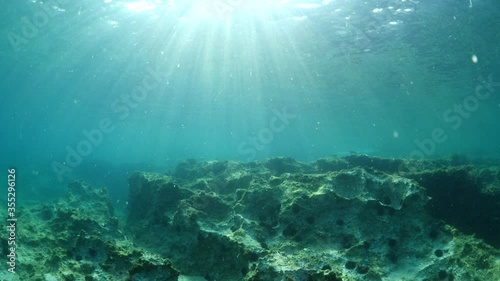 Wallpaper Mural sun ray and sun beam scenery underwater waves on surface of water slow ocean scenery Torontodigital.ca