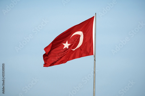 turkish republic flag waving in blue sky  turkish flag slow 