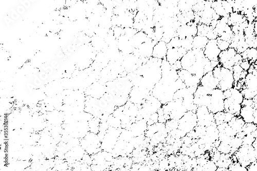 Distressed overlay texture of rough surface, dry soil, cracked ground. Grunge background. One color graphic resource.
