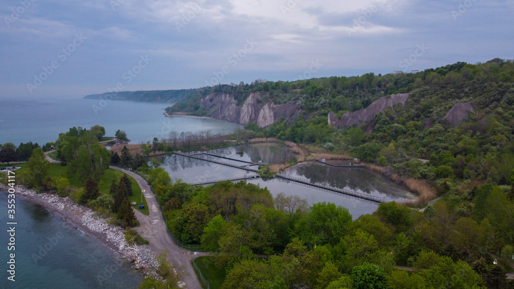 Aerial view of cliffs during cloudy weather