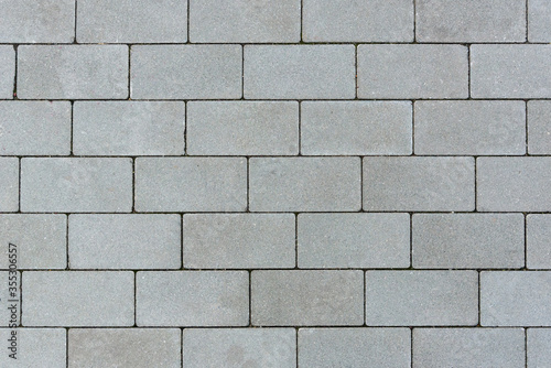 Background or texture made of gray sett pavement