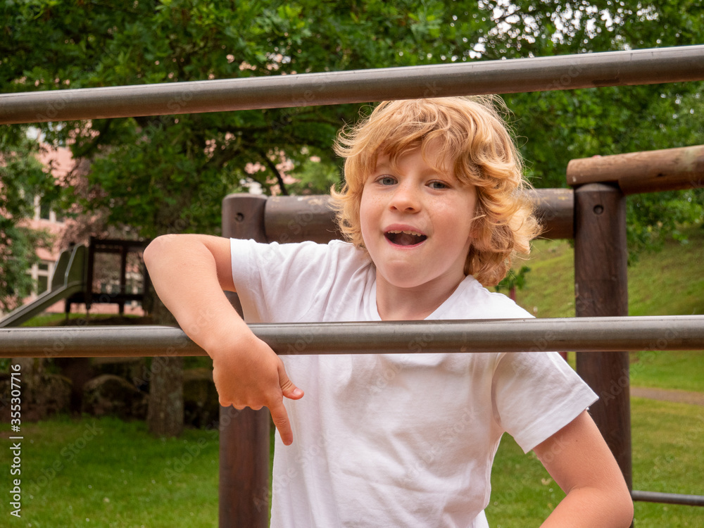 Fototapeta premium Portrait of Young Blonde Caucasian Boy