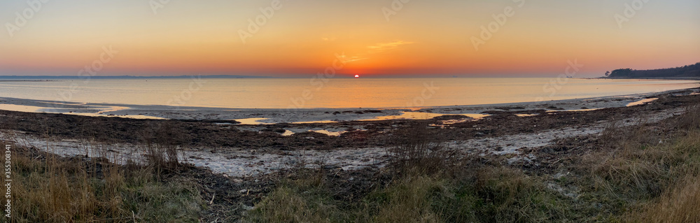 Panoramic Sunset at beach in south Sweden.