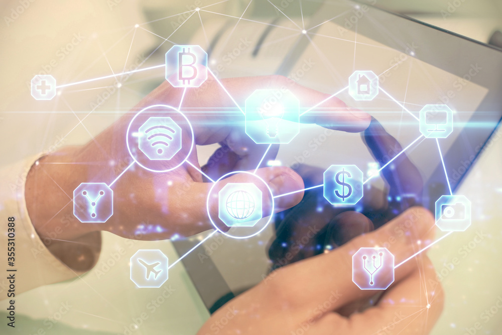 Double exposure of man's hands holding and using a phone and social network theme drawing. Double exposure of man's hands holding and using a phone and social network theme drawing.
