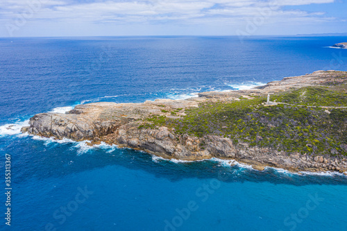 White lighthouse at Torndirrup National Park, Australia photo