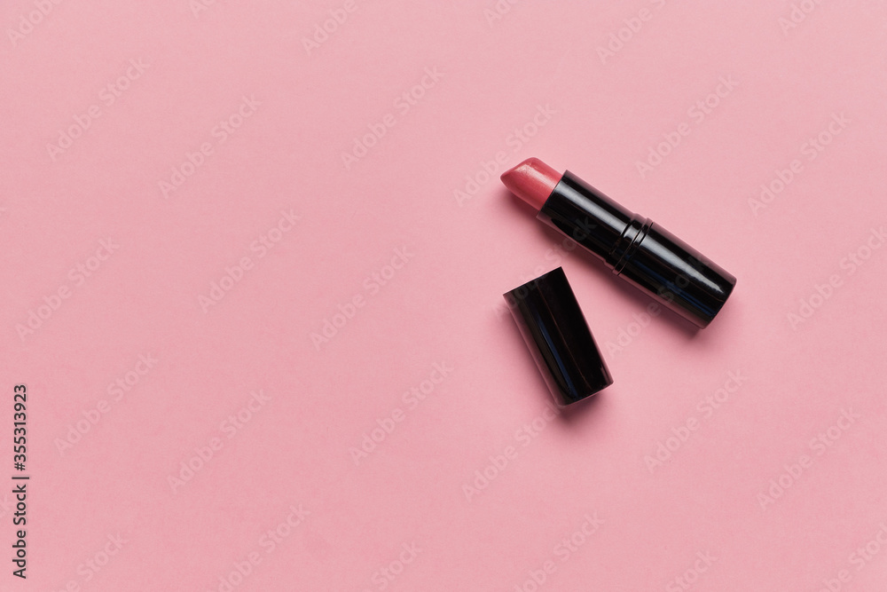 Pink lipstick with top view and copy space. Pink lipstick with top view and copy space.