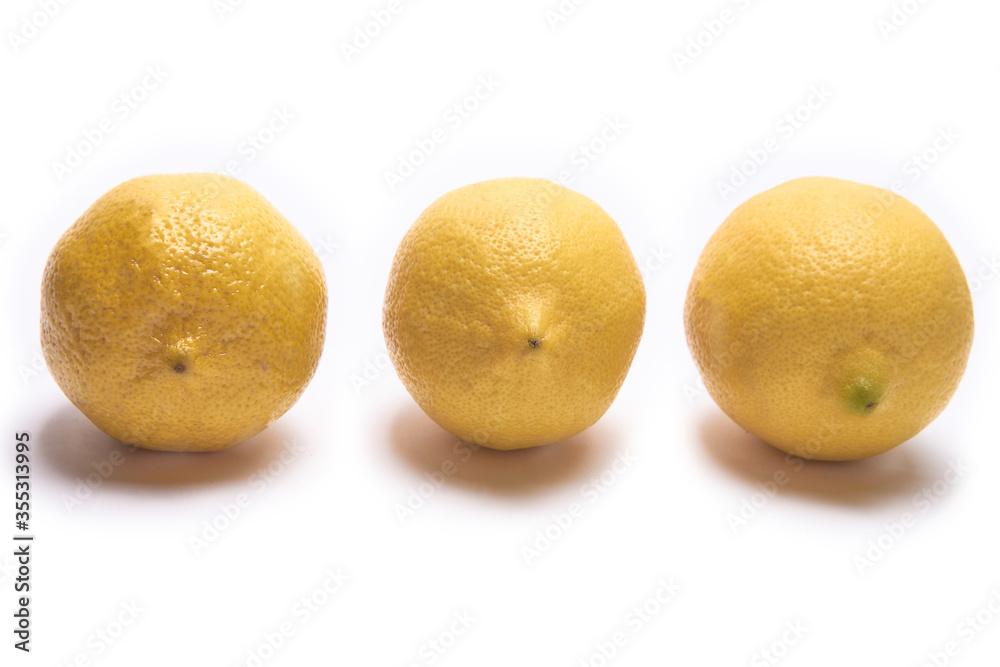 Three lemons on a white background Three lemons on a white background
