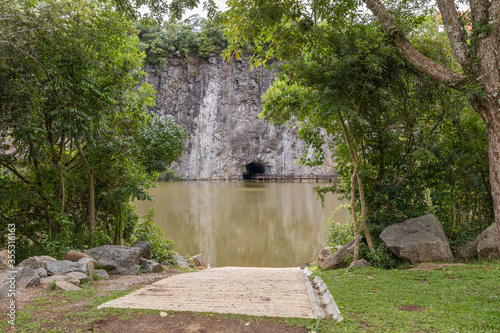 Natural lake framed by vast and lush vegetation with a mild climate.