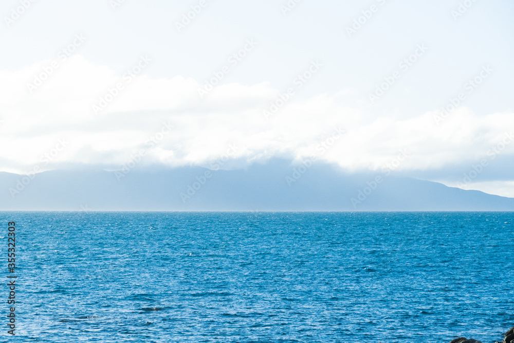 Calm mediterranean sea Ocean And Blue Sky Background waves soft surface, abstract background pattern
