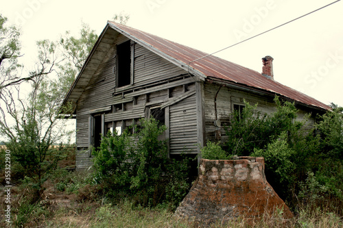 old house with a well © Bonnie
