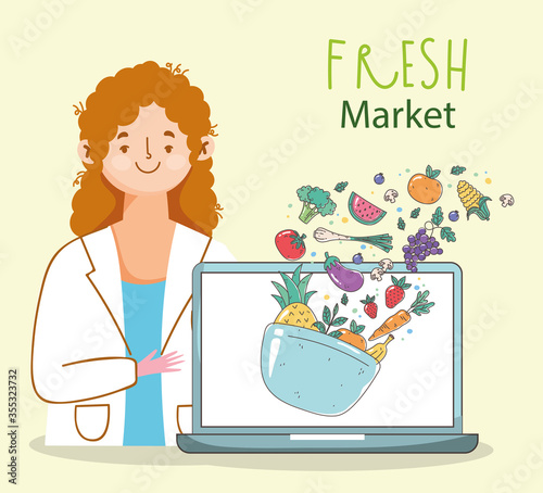 dietitian doctor fresh market laptop organic healthy food with fruits and vegetables