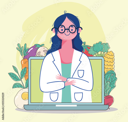 female dietitian doctor in video laptop, fresh market organic healthy food with fruits and vegetables