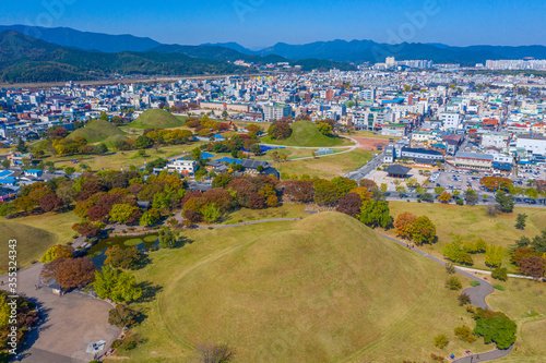 Panorama of Tumuli park and other royal tombs in the center of Korean town Gyeongju photo