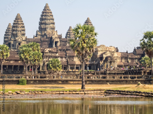 The iconic towers of Angkor Wat and the lake at the west gate - Siem Reap  Cambodia