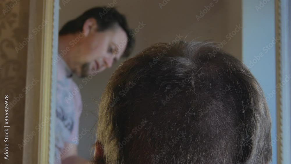The Electric Hair Clipper Starts the Haircut. 4K Footage The Electric Hair Clipper Starts the Haircut. 4K Footage