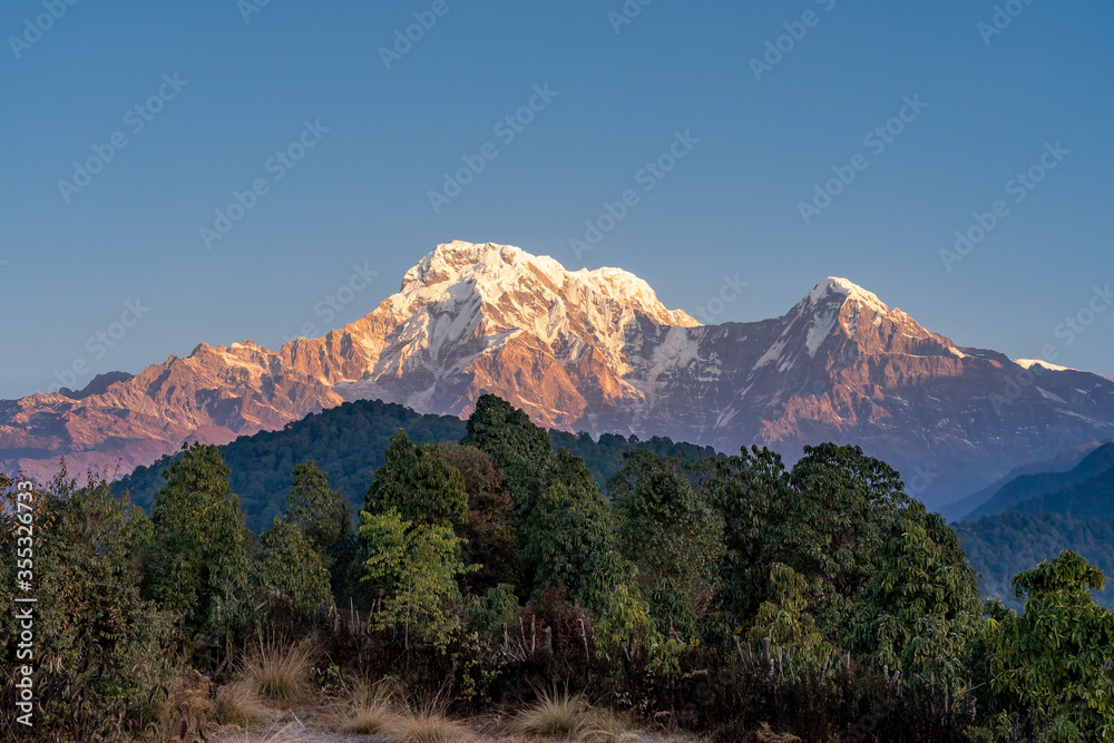 Redish tone display at Annapurna South and Hiunchuli seen from View Camp of Mardi Trek, Kaski District, Western NEPAL (Left and Right)