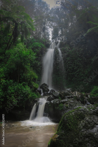 Falling waterfall, treated greenery