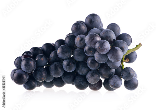 Obraz na plátně Bunch of black grapes isolated on white background