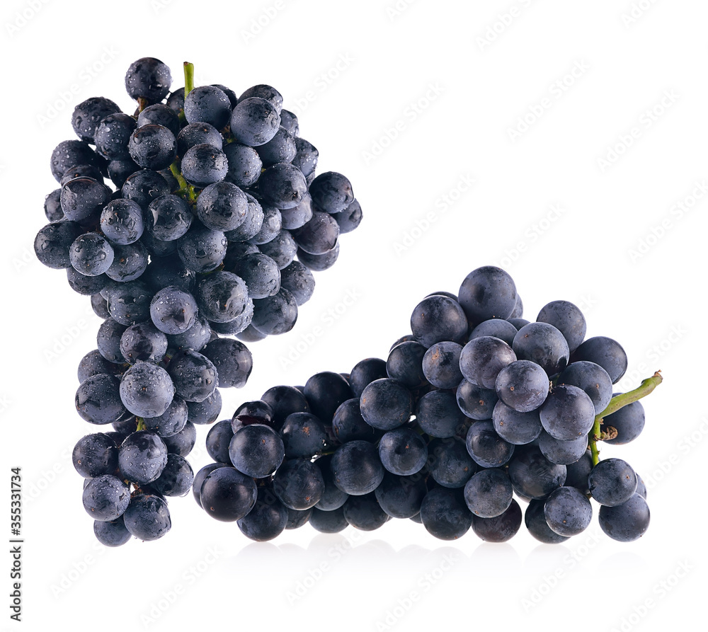 Bunch of black grapes isolated on white background Bunch of black grapes isolated on white background