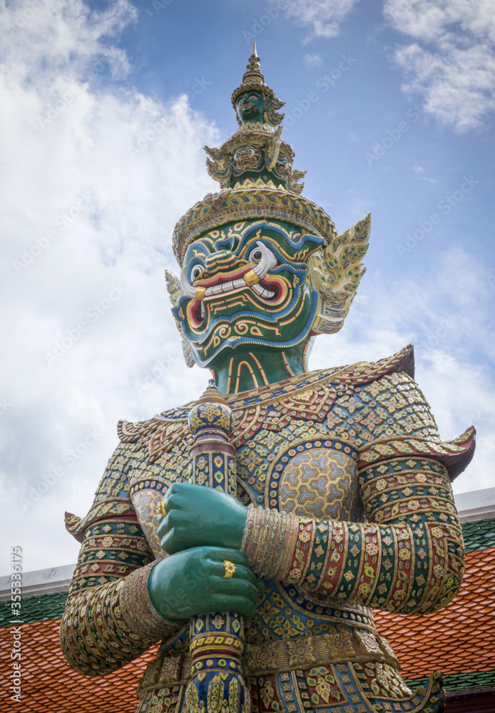 Giant statue at Temple of the Emerald Buddha (Wat phra kaew) ,Bangkok,Thailand. Giant statue at Temple of the Emerald Buddha (Wat phra kaew) ,Bangkok,Thailand.